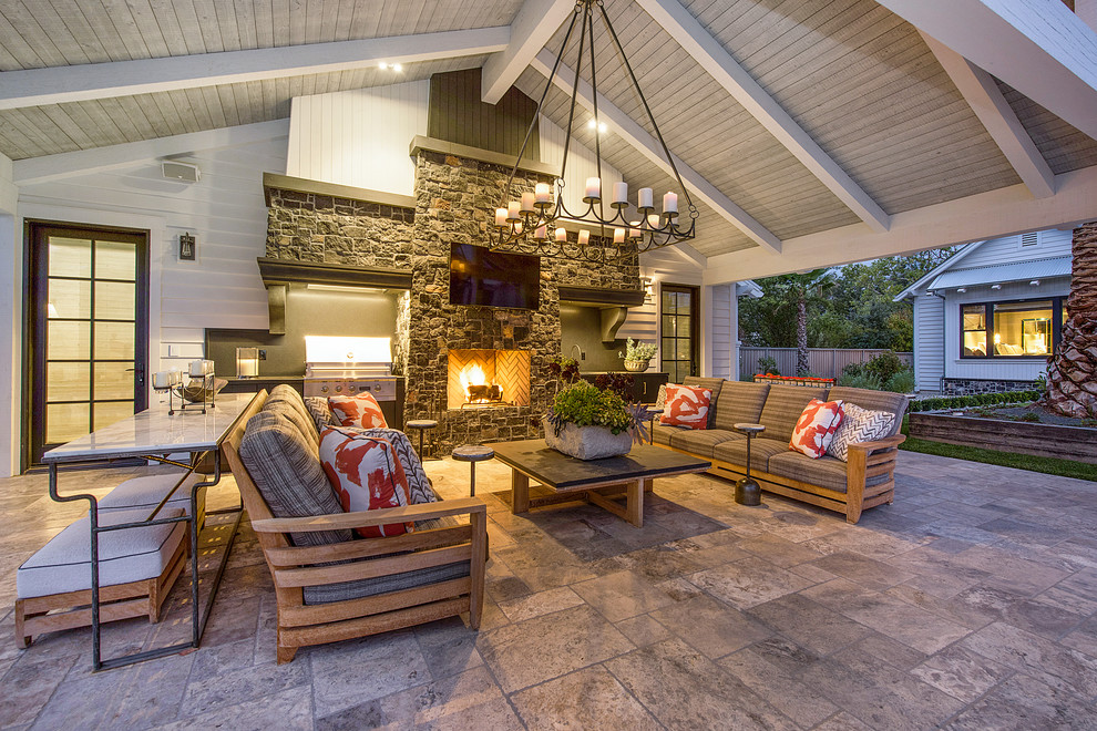 Photo of a large rural back patio in San Francisco with a fireplace, tiled flooring and a gazebo.