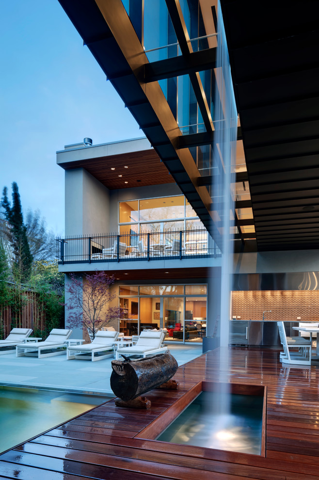 Idées déco pour une terrasse en bois contemporaine avec une cuisine d'été.