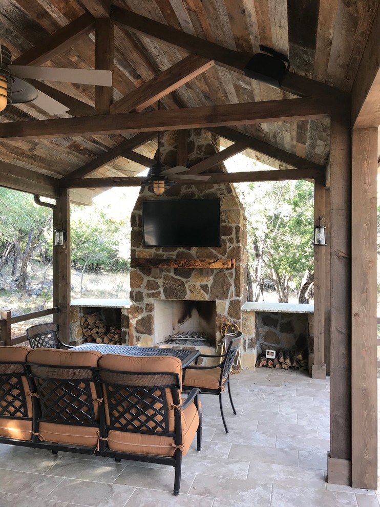 Mid-sized mountain style backyard patio photo in Other with a gazebo