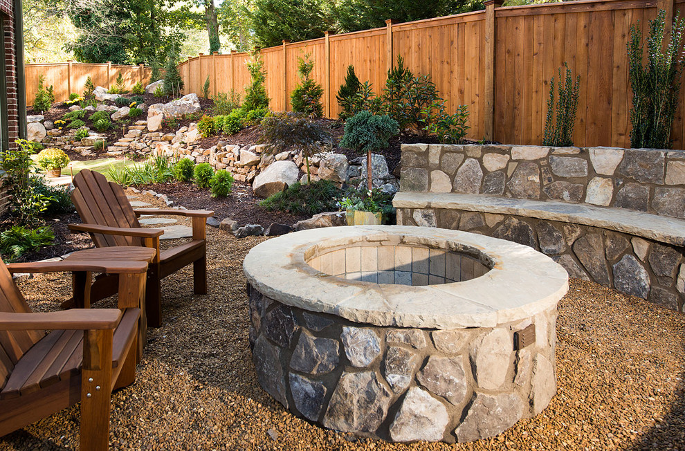 Large mountain style backyard gravel patio photo in Atlanta with a fire pit and no cover