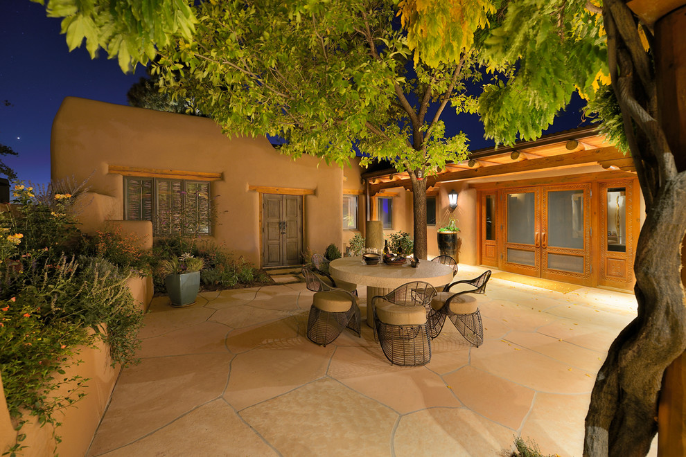 This is an example of an eclectic patio in Albuquerque.