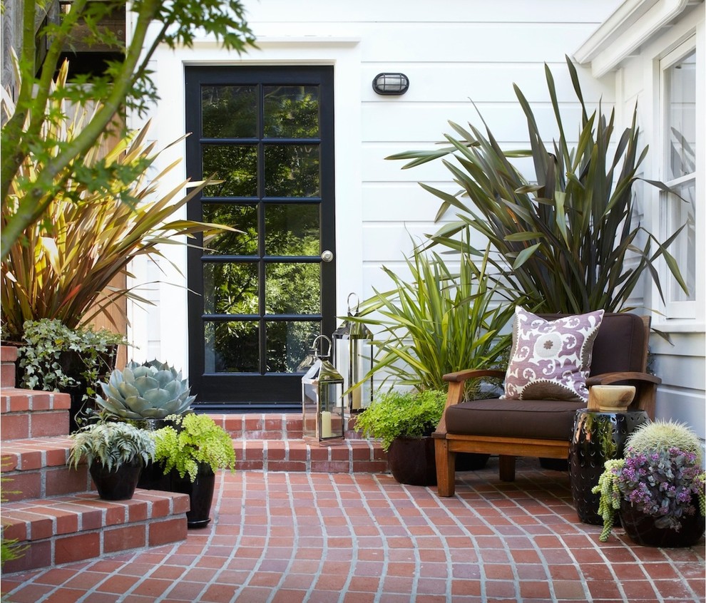 Design ideas for a traditional patio steps in San Francisco with brick paving.