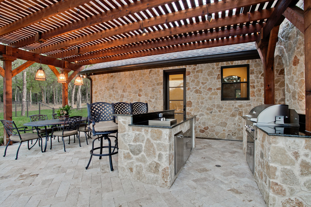 This is an example of a large mediterranean patio in Dallas with a pergola, brick paving and a bar area.