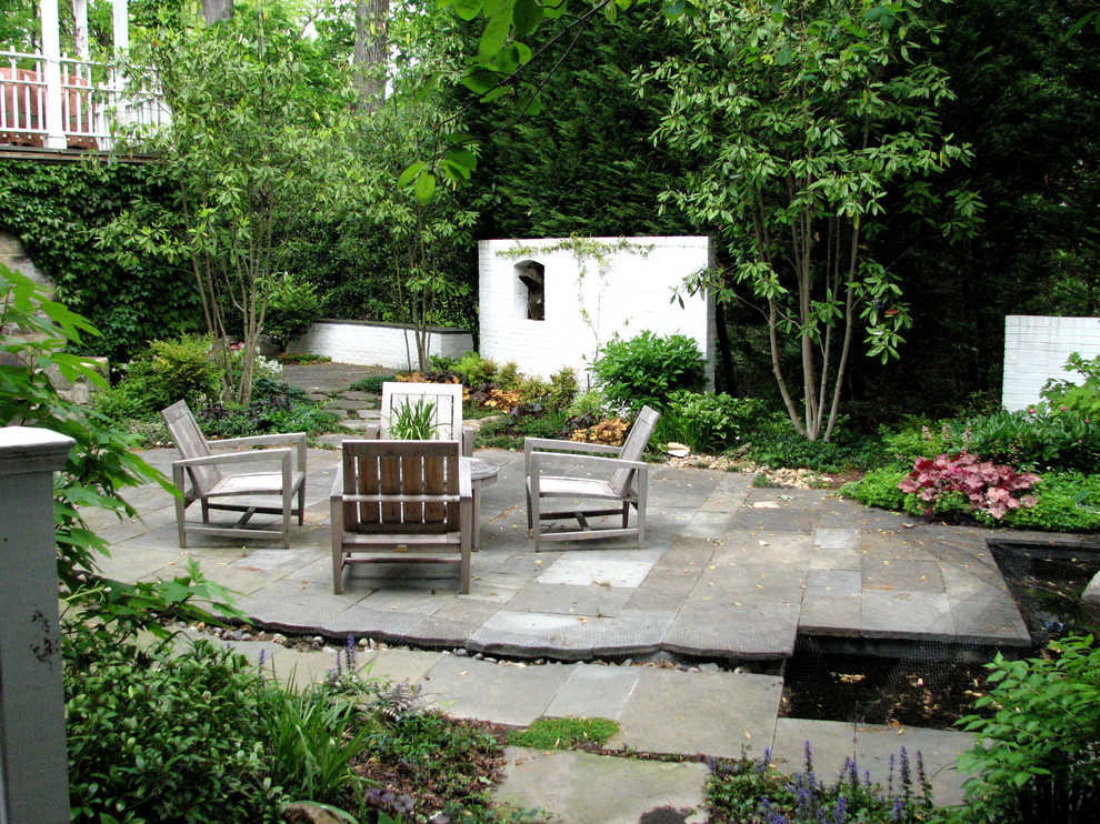 This is an example of a traditional patio in DC Metro with a water feature.