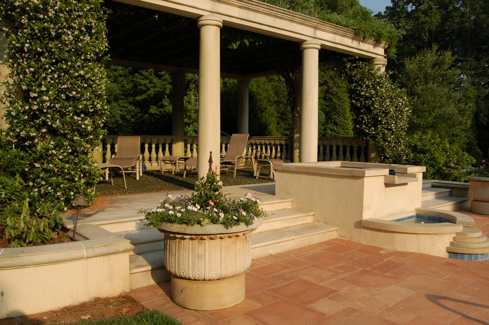 This is an example of a mediterranean patio in Raleigh.
