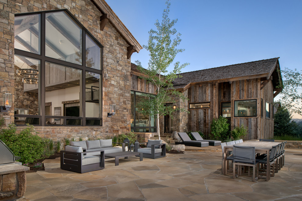 This is an example of a rustic patio in Other with no cover.