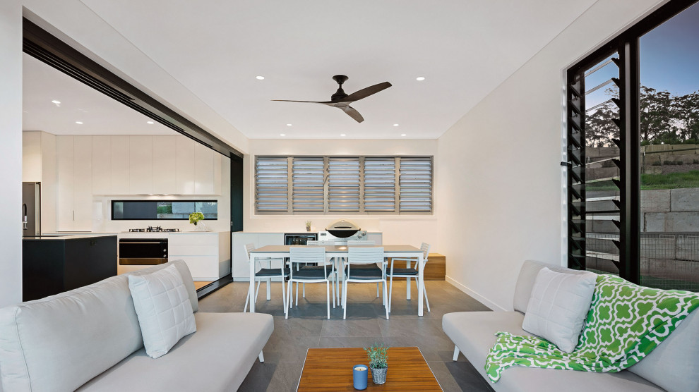 Aluminium Cavity Sliding Door and Louvre Window next to a Fixed Window Modern Patio