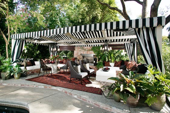 Design ideas for a large contemporary back patio in Sacramento with concrete slabs and a gazebo.