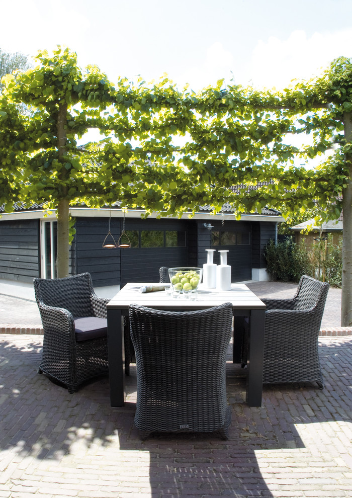 Inspiration for a contemporary patio remodel in Amsterdam with no cover