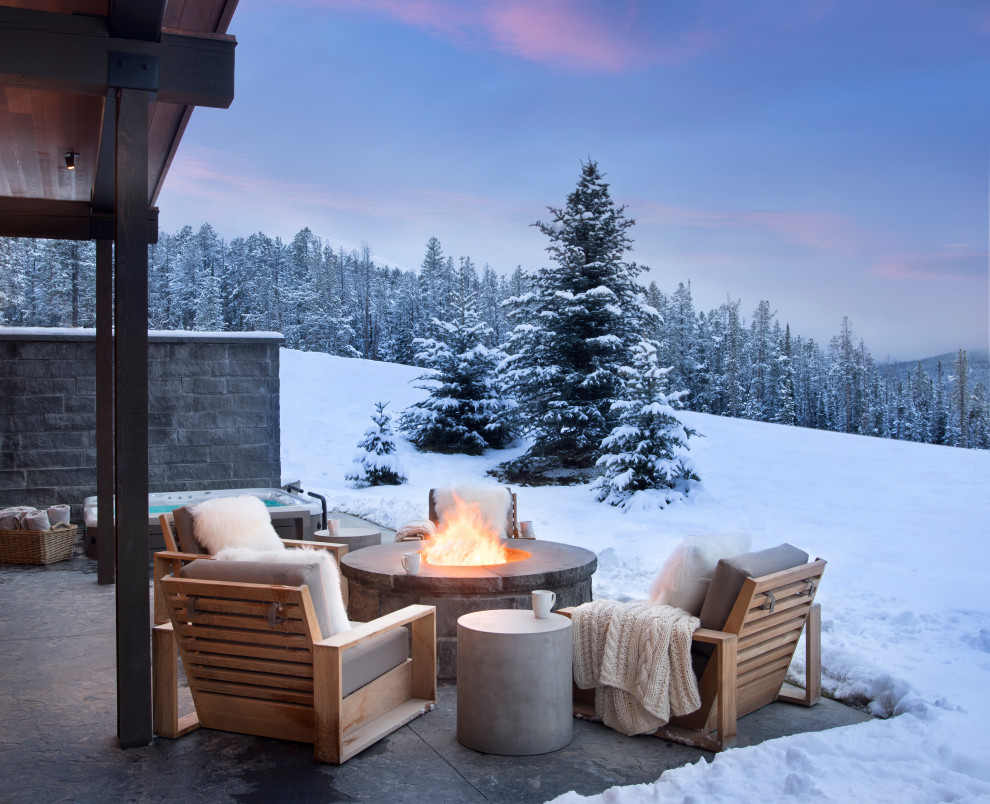 Inspiration for a rustic patio remodel in Other with a fire pit and no cover