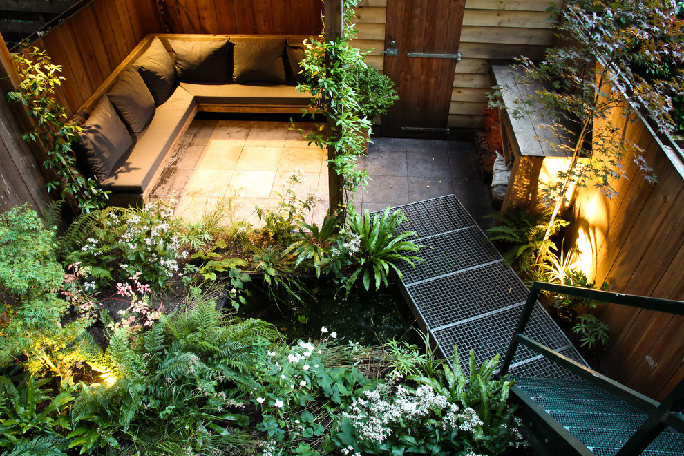 Idee per un piccolo patio o portico minimal dietro casa