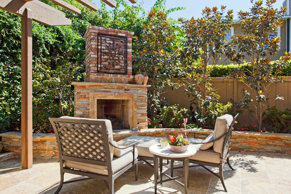 Inspiration for a classic patio in San Francisco with a pergola and fencing.