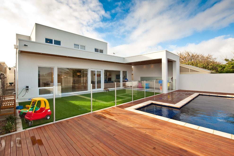 Photo of a medium sized contemporary back patio in Adelaide with a water feature, decking and no cover.
