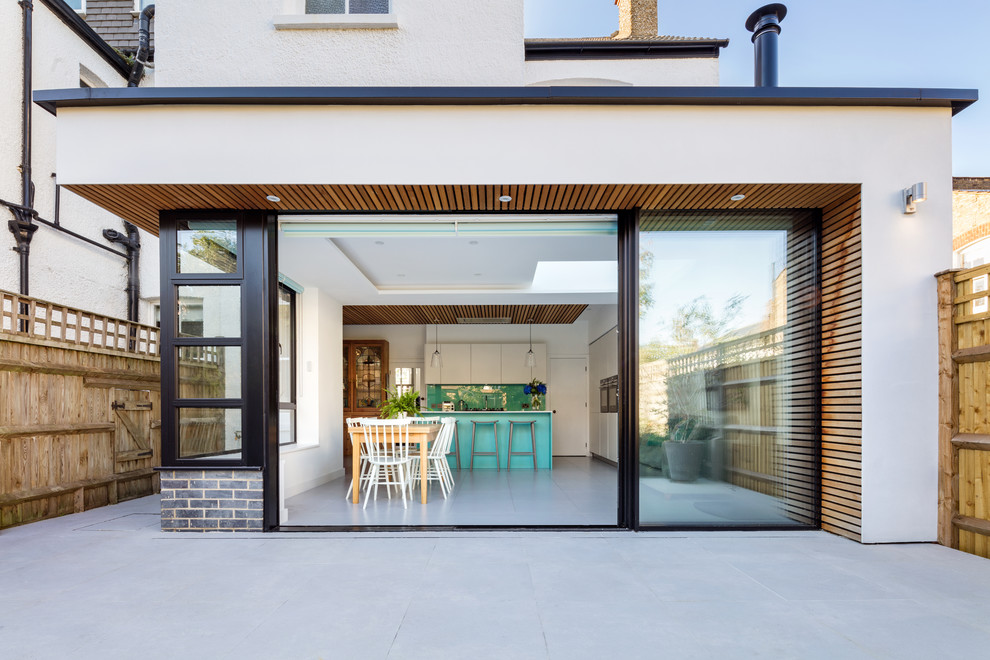 Idee per un patio o portico design dietro casa con nessuna copertura
