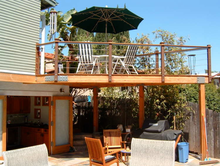 Inspiration for a medium sized classic back patio in San Diego with tiled flooring and no cover.