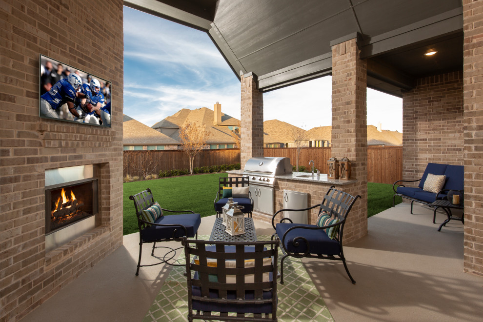 Design ideas for a large back patio in Houston with tiled flooring, a roof extension and a bbq area.