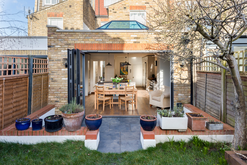 This is an example of a large rural patio in London.