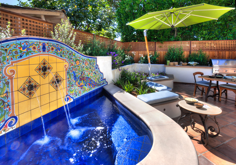 Inspiration for a small mediterranean backyard tile patio fountain remodel in San Luis Obispo