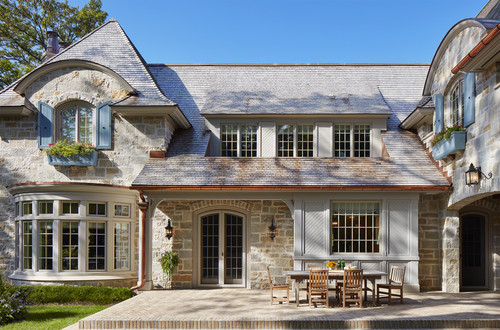 French country home with French doors and windows