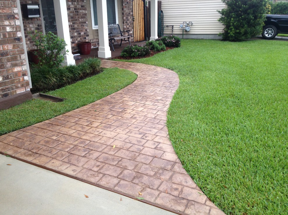 Stamped & stained walkway and porch Traditional Patio New Orleans