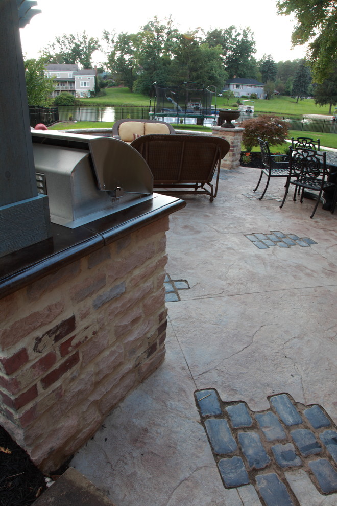 Stamped Concrete Outdoor Kitchen with Paver Inlays Traditional