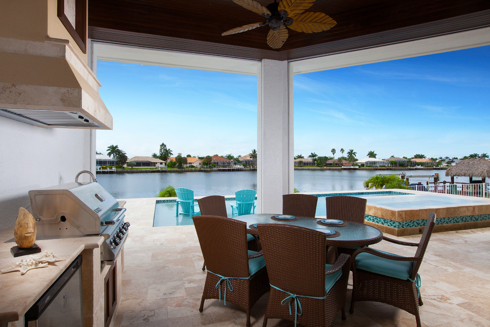 Photo of a large nautical back patio in Miami.