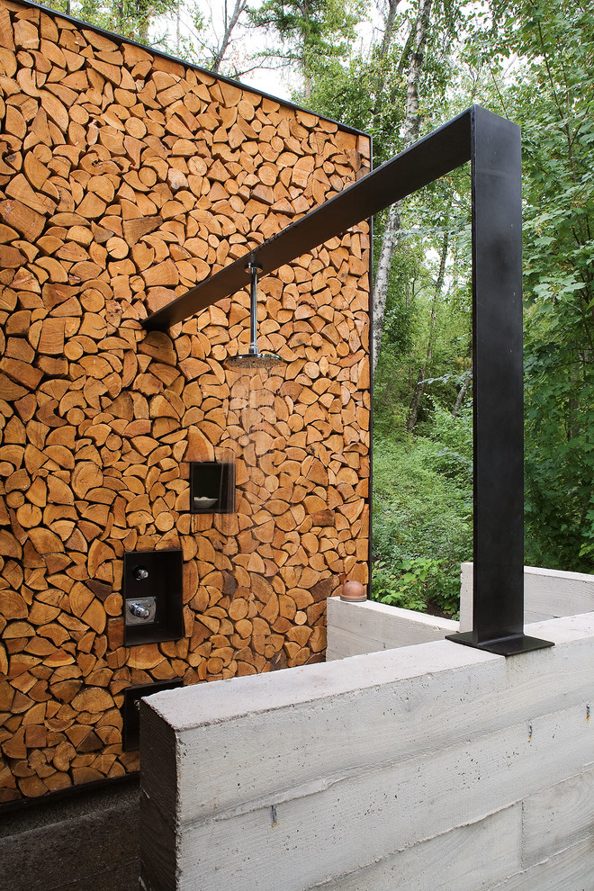 Mountain style outdoor patio shower photo in Austin with no cover