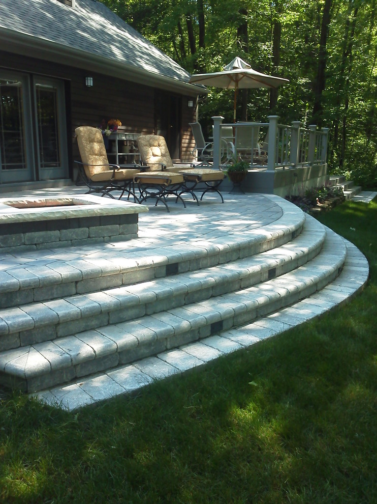 stone patio & maintenance free deck Traditional Patio Other by