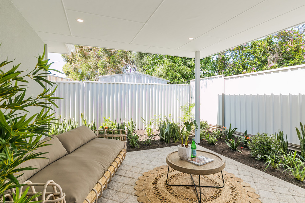 Photo of a small contemporary back patio in Perth with concrete paving and a roof extension.