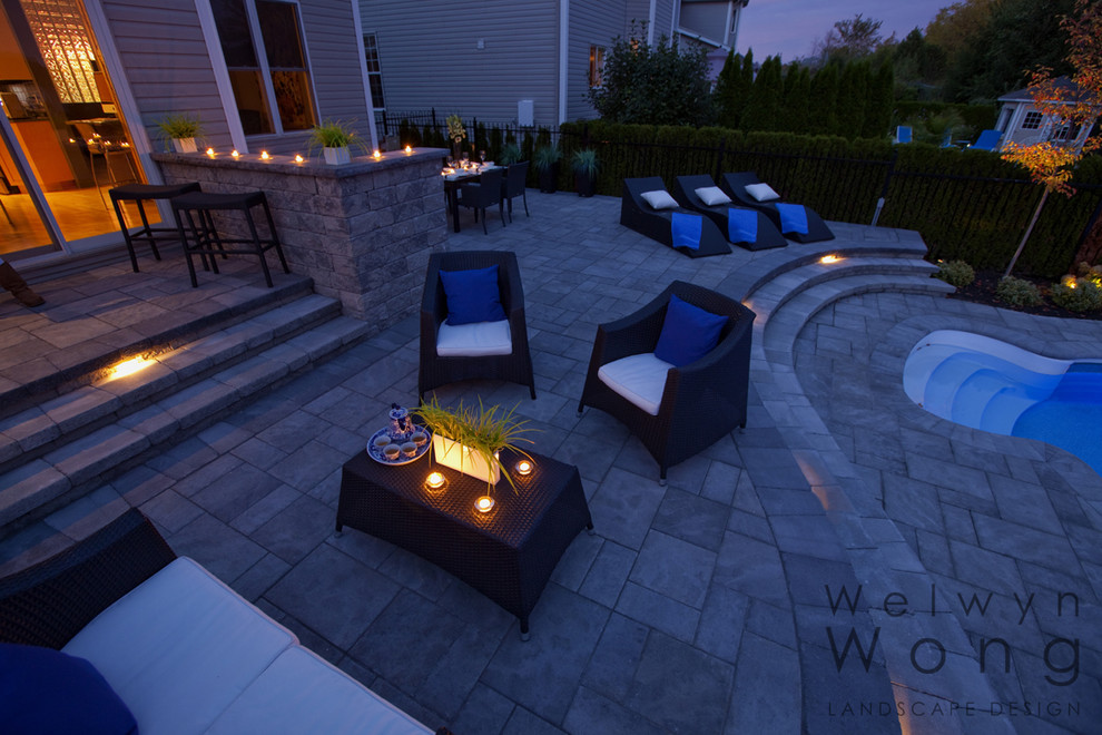 This is an example of a contemporary patio in Ottawa.
