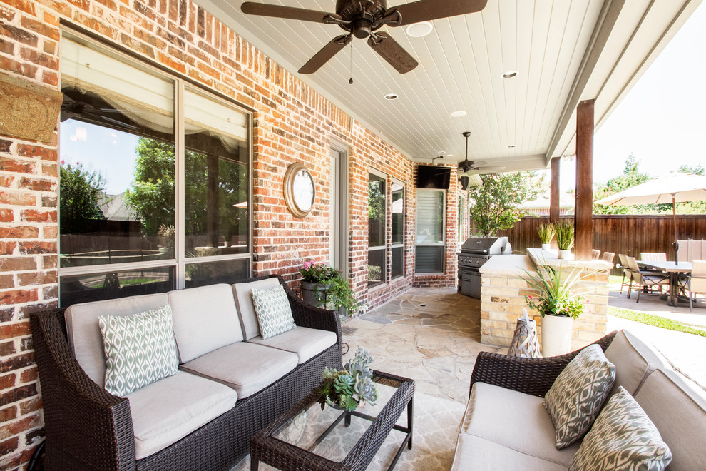Design ideas for a large rustic back patio in Dallas with an outdoor kitchen, decking and a roof extension.