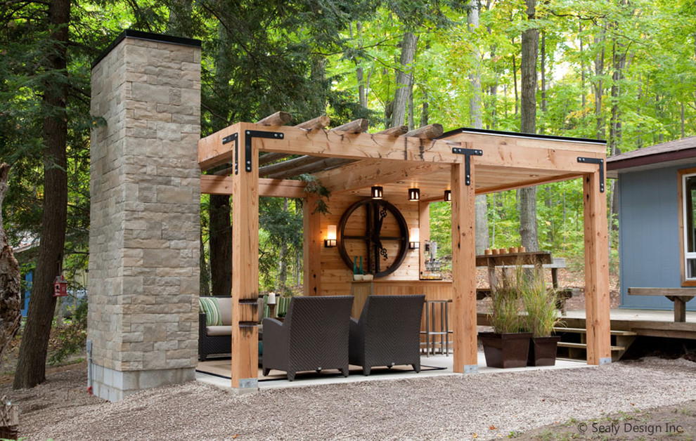 This is an example of a contemporary patio in Toronto with a gazebo.