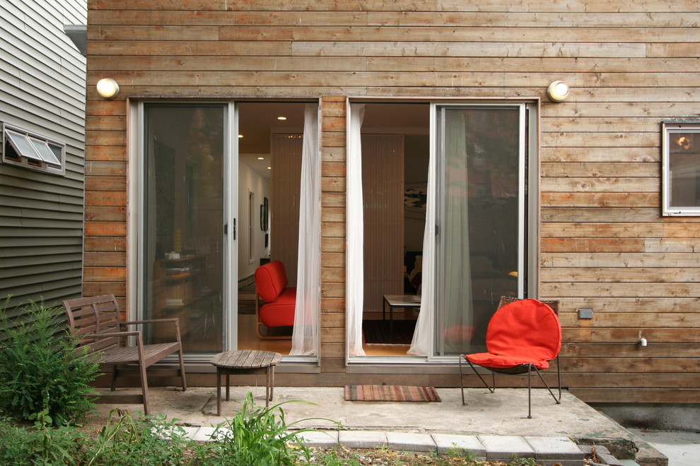 Diseño de patio actual con losas de hormigón