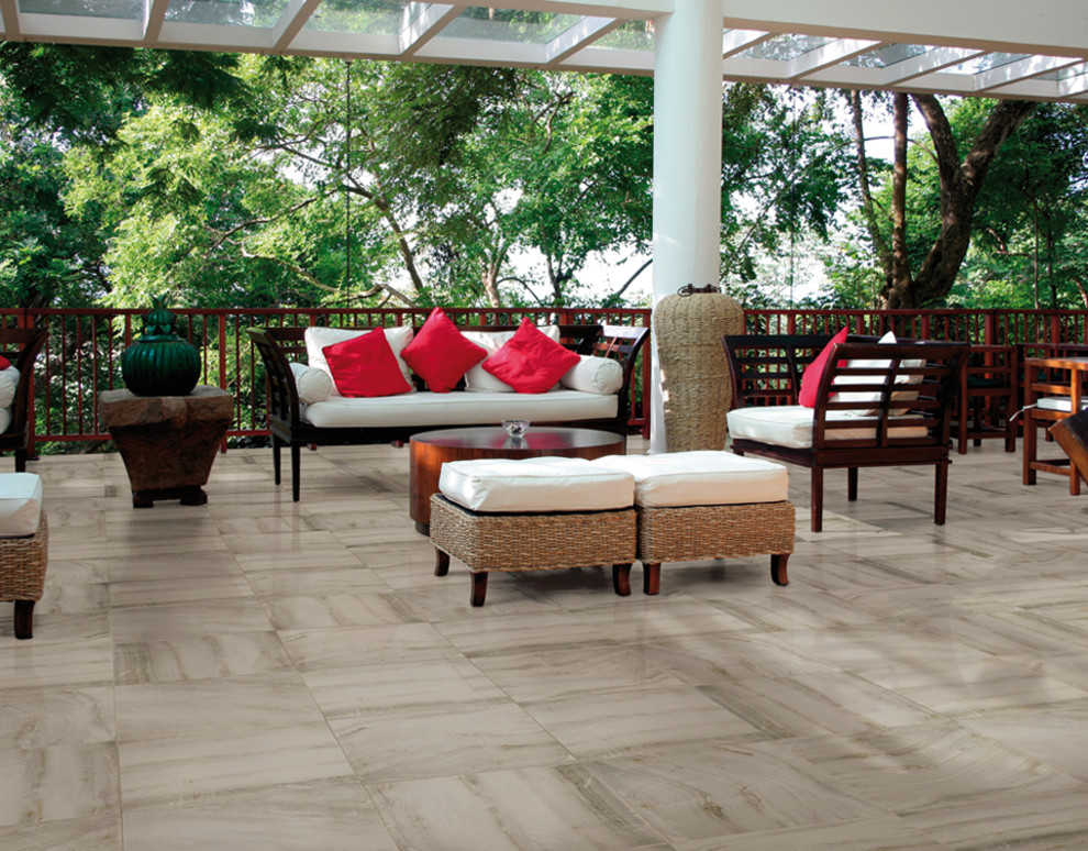 Design ideas for an expansive mediterranean back patio in Baltimore with tiled flooring and a pergola.