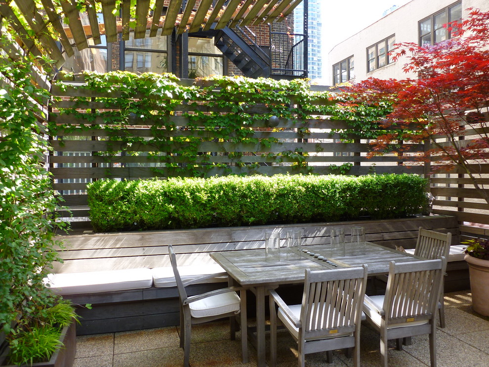 Large trendy patio vertical garden photo in New York