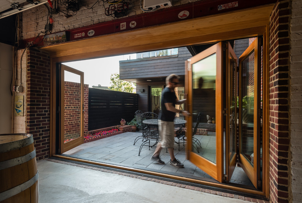 Modelo de patio minimalista de tamaño medio sin cubierta en patio con cocina exterior y adoquines de piedra natural