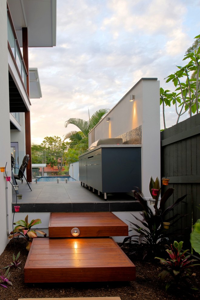 Example of a trendy patio design in Brisbane
