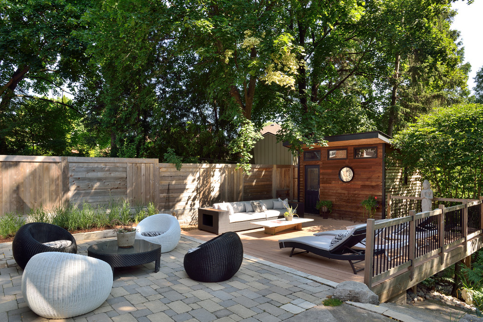 Design ideas for a contemporary patio in Toronto with concrete paving and no cover.