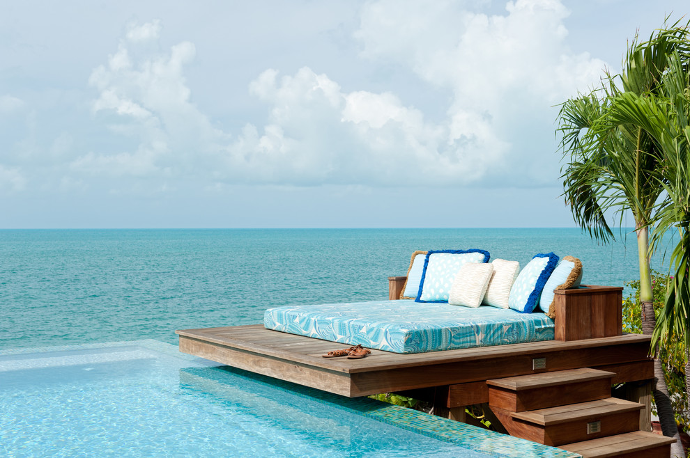 Patio - tropical patio idea in New York with decking