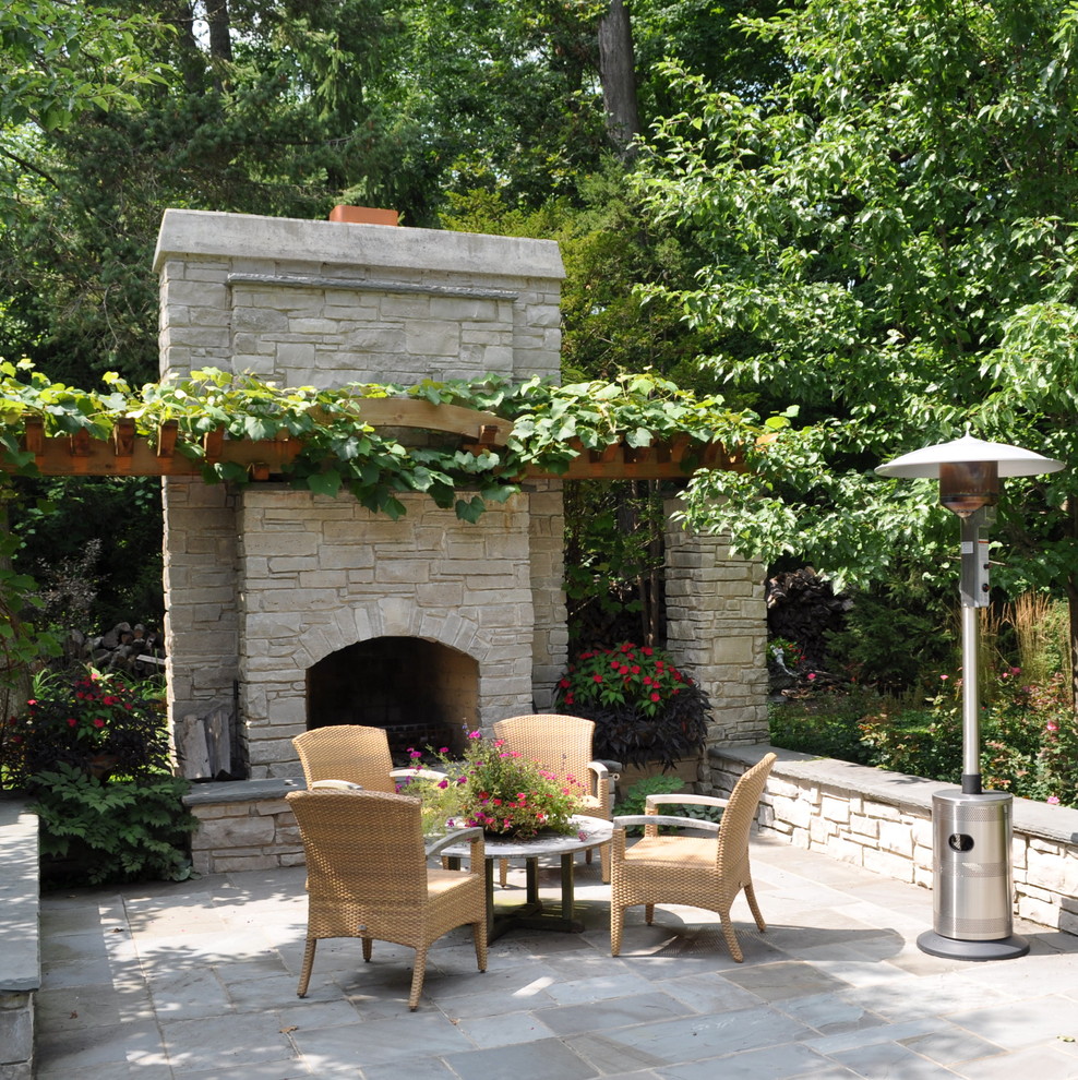 Patio - traditional patio idea in Chicago with a fire pit