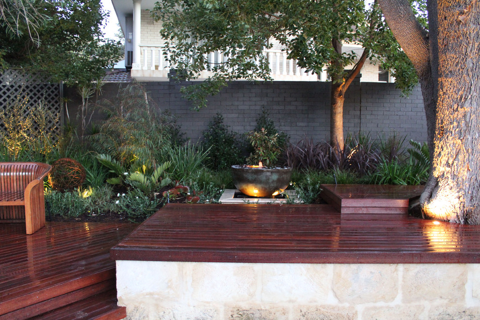 Example of an island style patio design in Perth