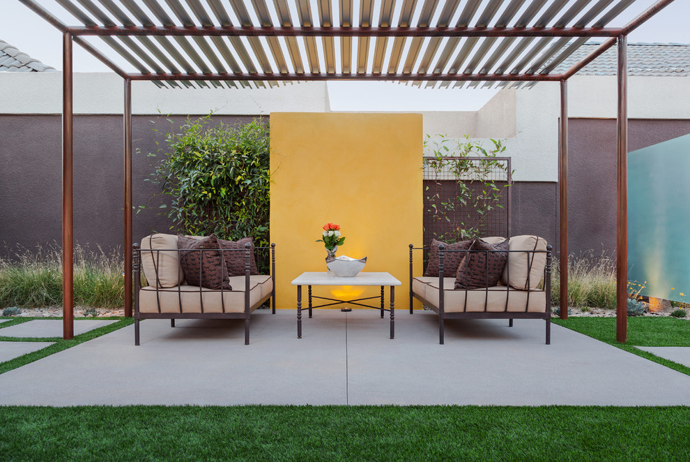 Inspiration for a large modern backyard patio remodel in Phoenix with a gazebo