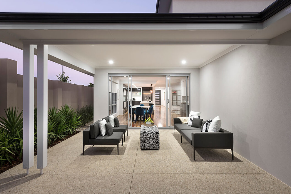 Patio - mid-sized contemporary backyard concrete patio idea in Perth with a roof extension
