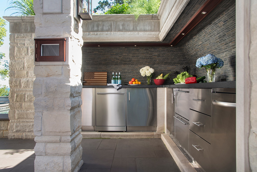 Huge elegant backyard patio kitchen photo in Chicago