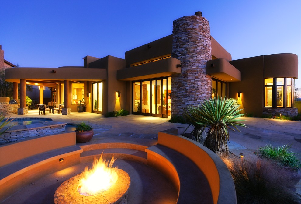 Southwest patio photo in Phoenix with a fire pit