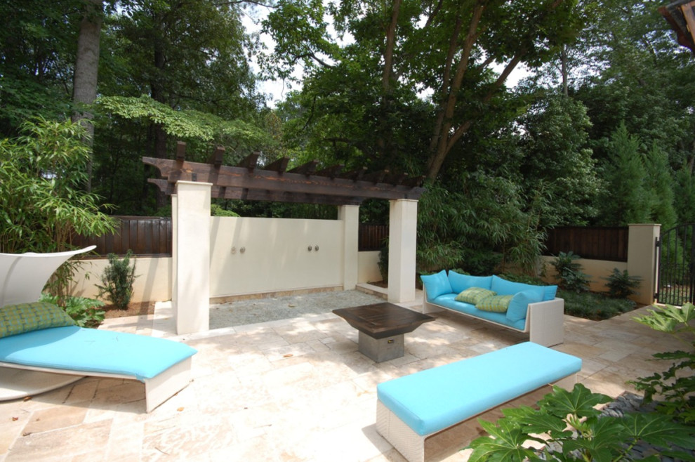 Patio - contemporary courtyard patio idea in Atlanta with a pergola