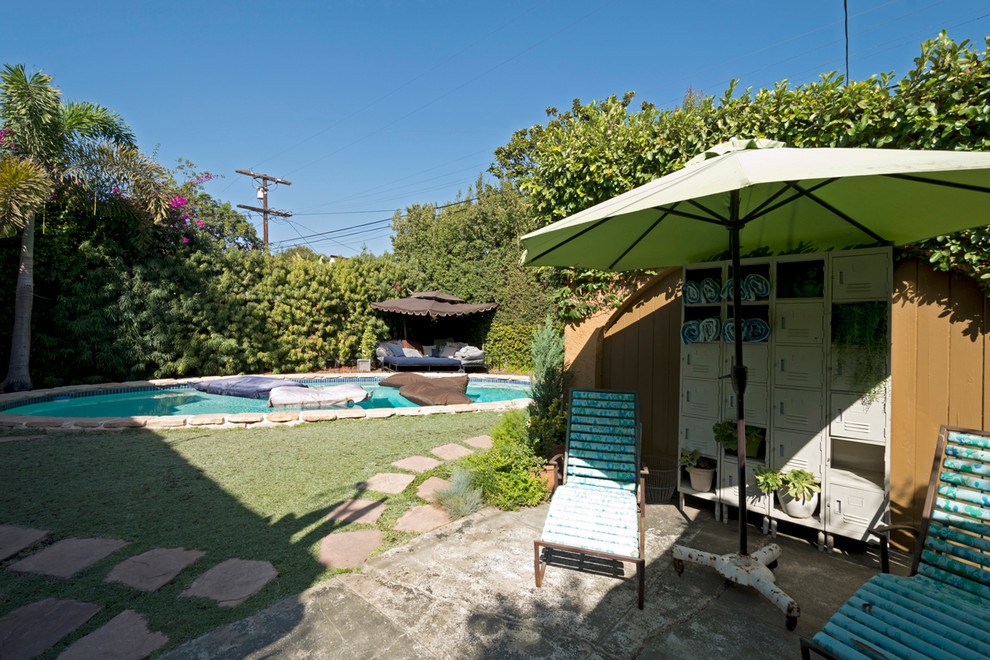 Classic patio in Los Angeles with no cover.