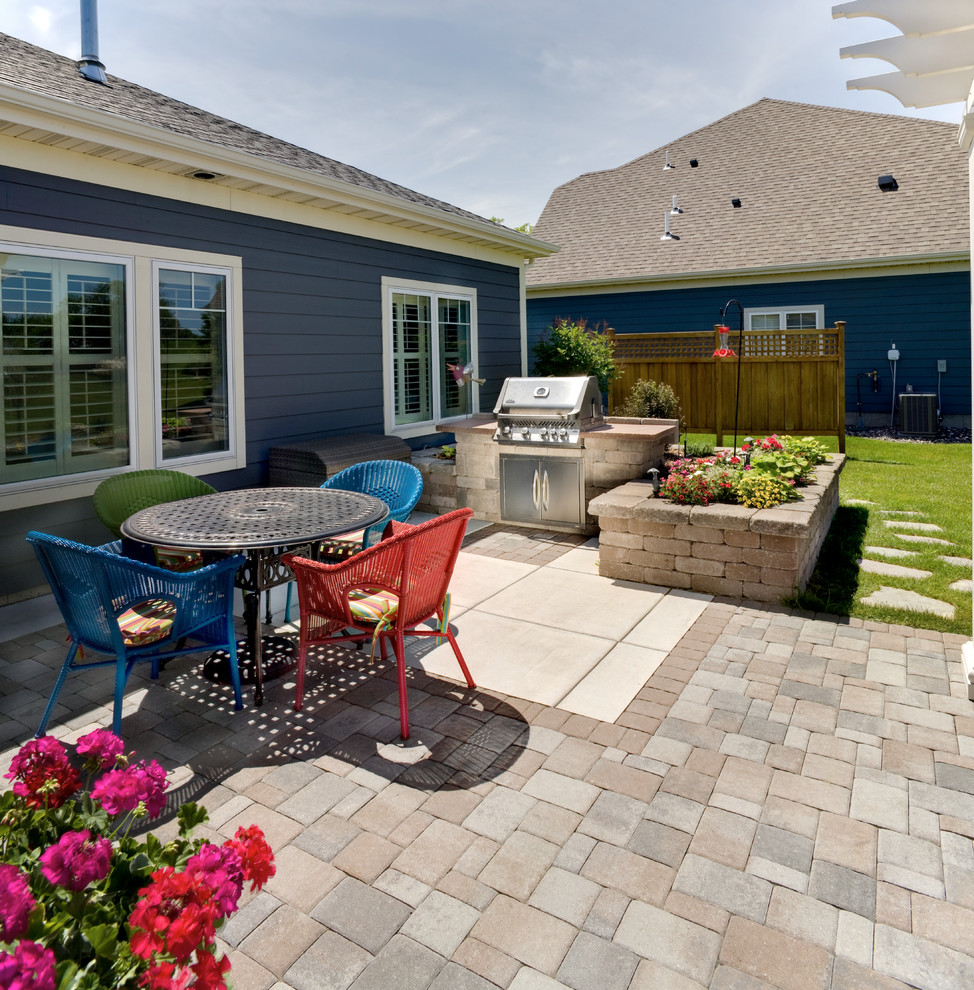 This Outdoor Kitchen Rocks Patio Minneapolis by Villa Landscapes