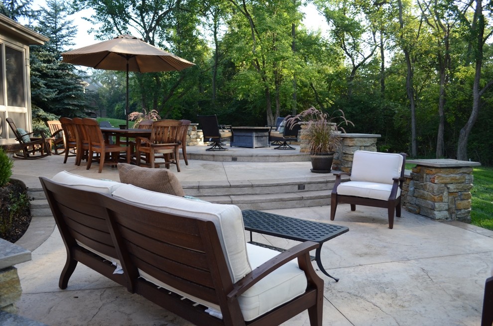 Inspiration for a timeless backyard stamped concrete patio remodel in Cincinnati