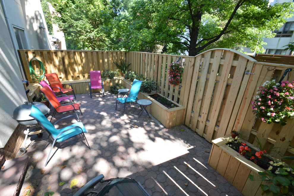 Townhouse patio with fence, benches and planter boxes Traditional Patio Baltimore by Ivy